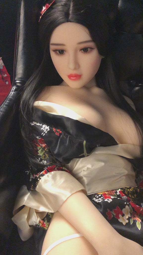 Asian Robotic Doll Lucy 168cm - laying in chair